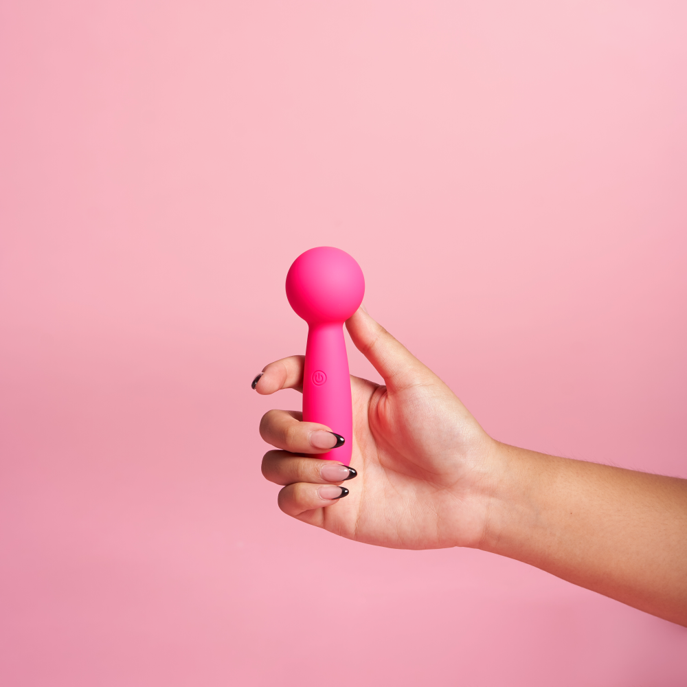 Lolly clitoral vibrator — in hand